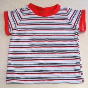 For the kids t-shirt. Repeat the neckline procedure described before with the sleeve cuffs. For the women's t-shirt. Fold the sleeve 1/2 inch and sew along. 